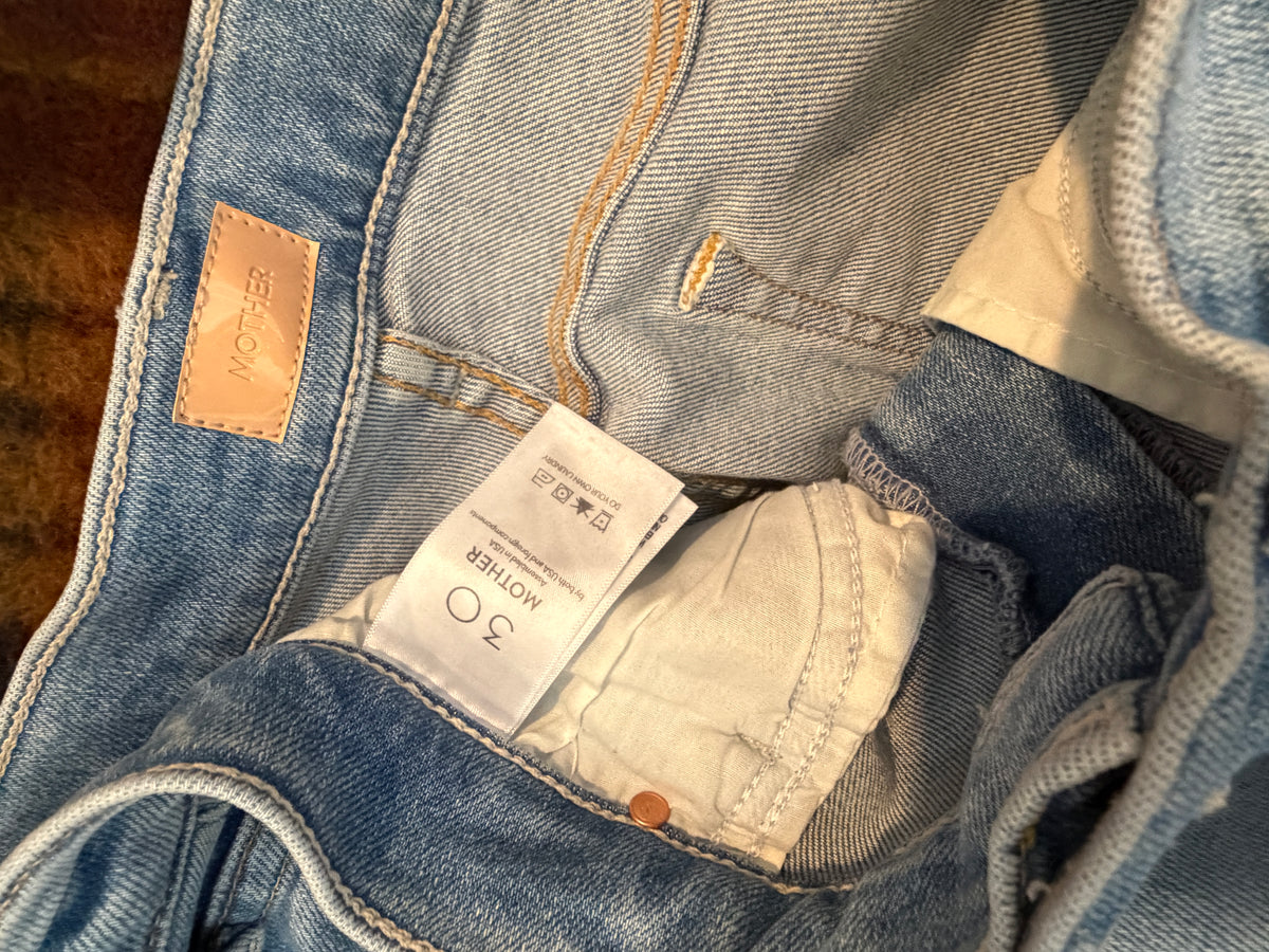 MOTHER Light Wash Cropped Bootcut Jeans — care label