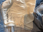 MOTHER Light Wash Cropped Bootcut Jeans — care label