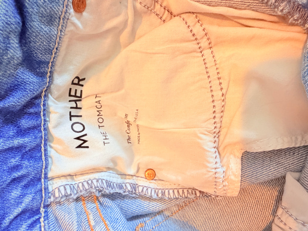 MOTHER Distressed Light Wash Boyfriend Jeans — care label