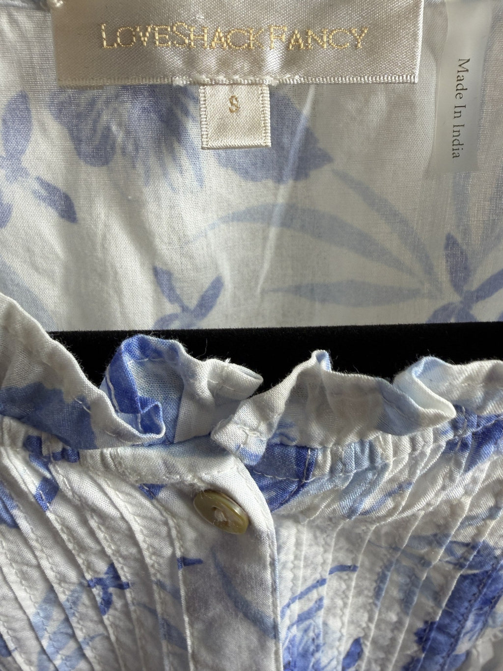 LoveShackFancy Floral Ruffle Crop Top – Blue – label