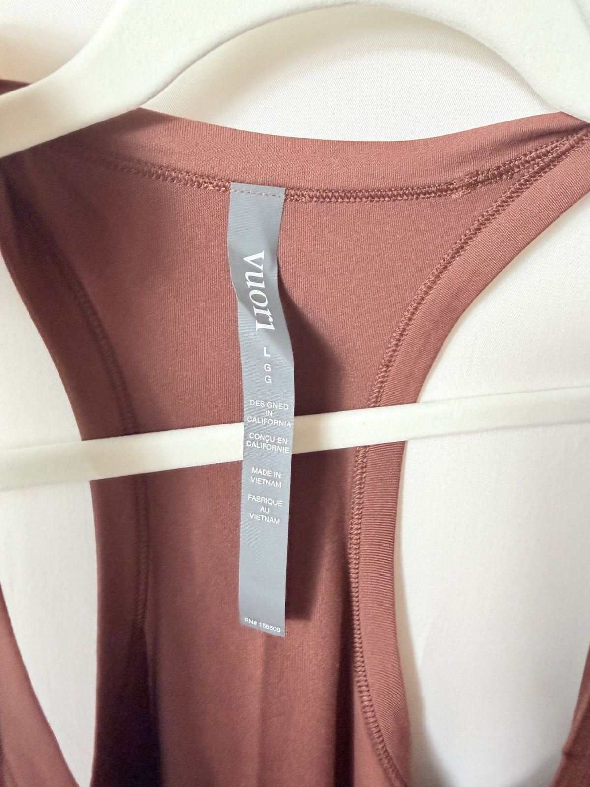 Vuori Lux Racerback Tank – Burnt Sienna - care label
