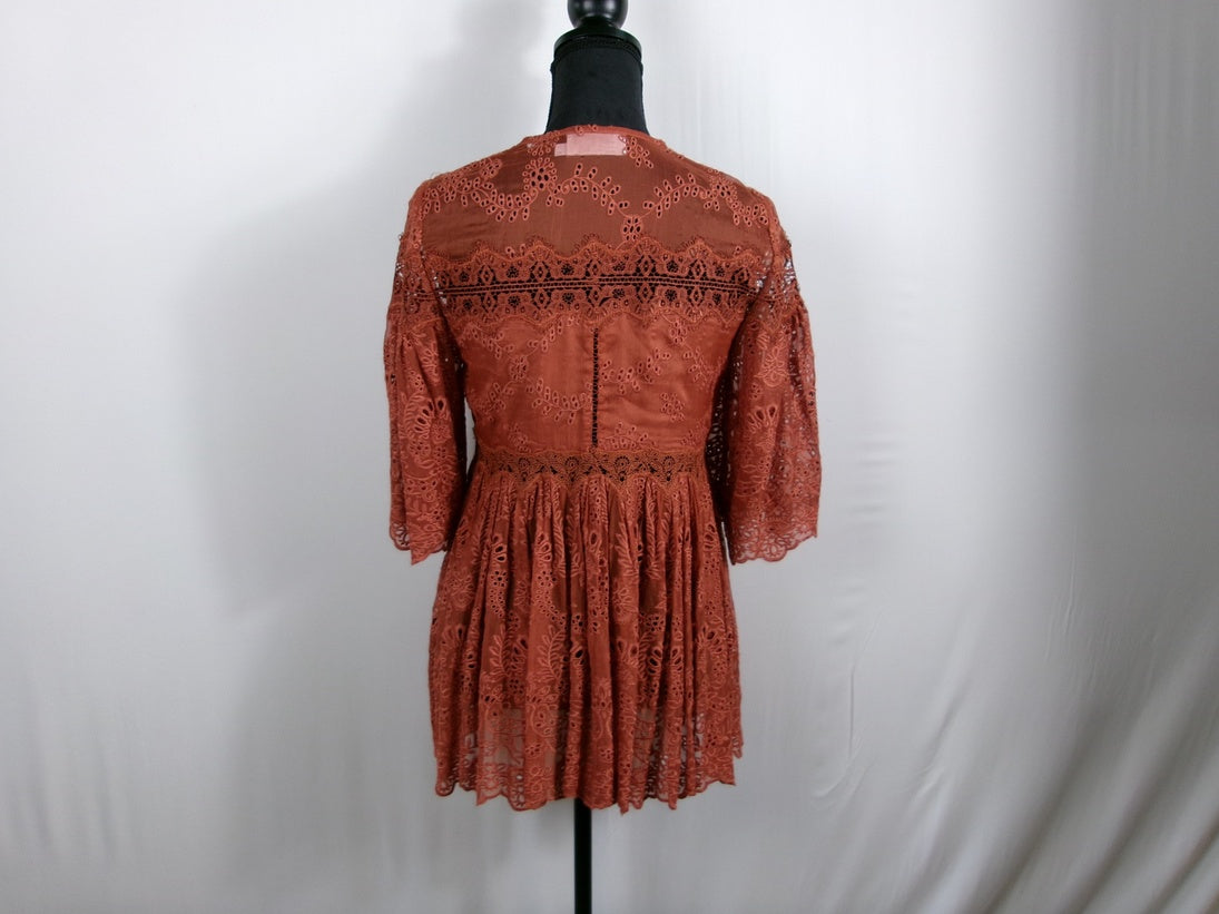Zimmermann Silk Lace Peplum Blouse — Rust – back