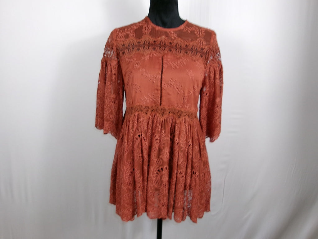 Zimmermann Silk Lace Peplum Blouse — Rust – front