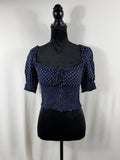 Reformation Polka Dot Tie-Front Puff-Sleeve Crop Top – Navy – front