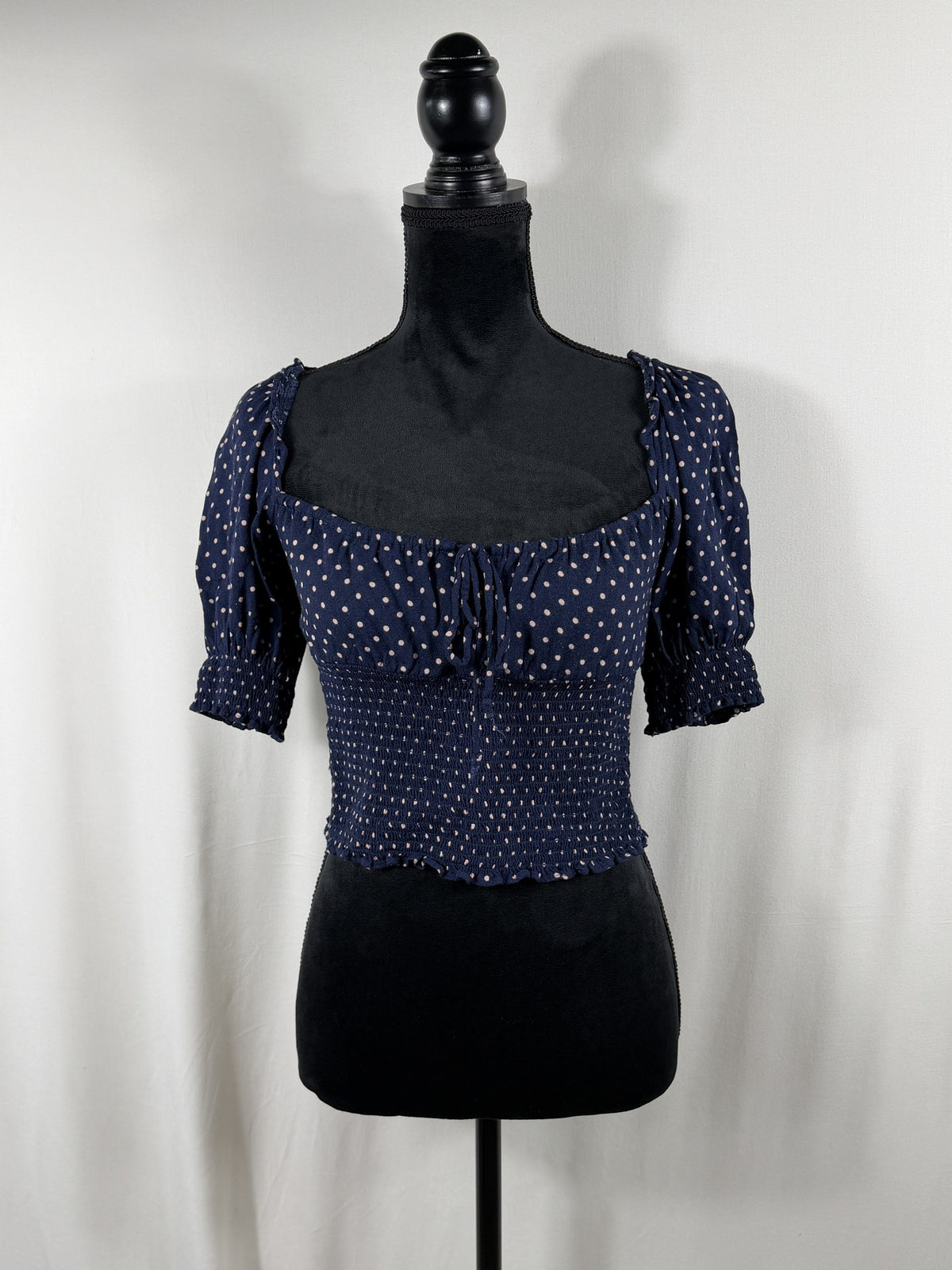Reformation Polka Dot Tie-Front Puff-Sleeve Crop Top – Navy – front