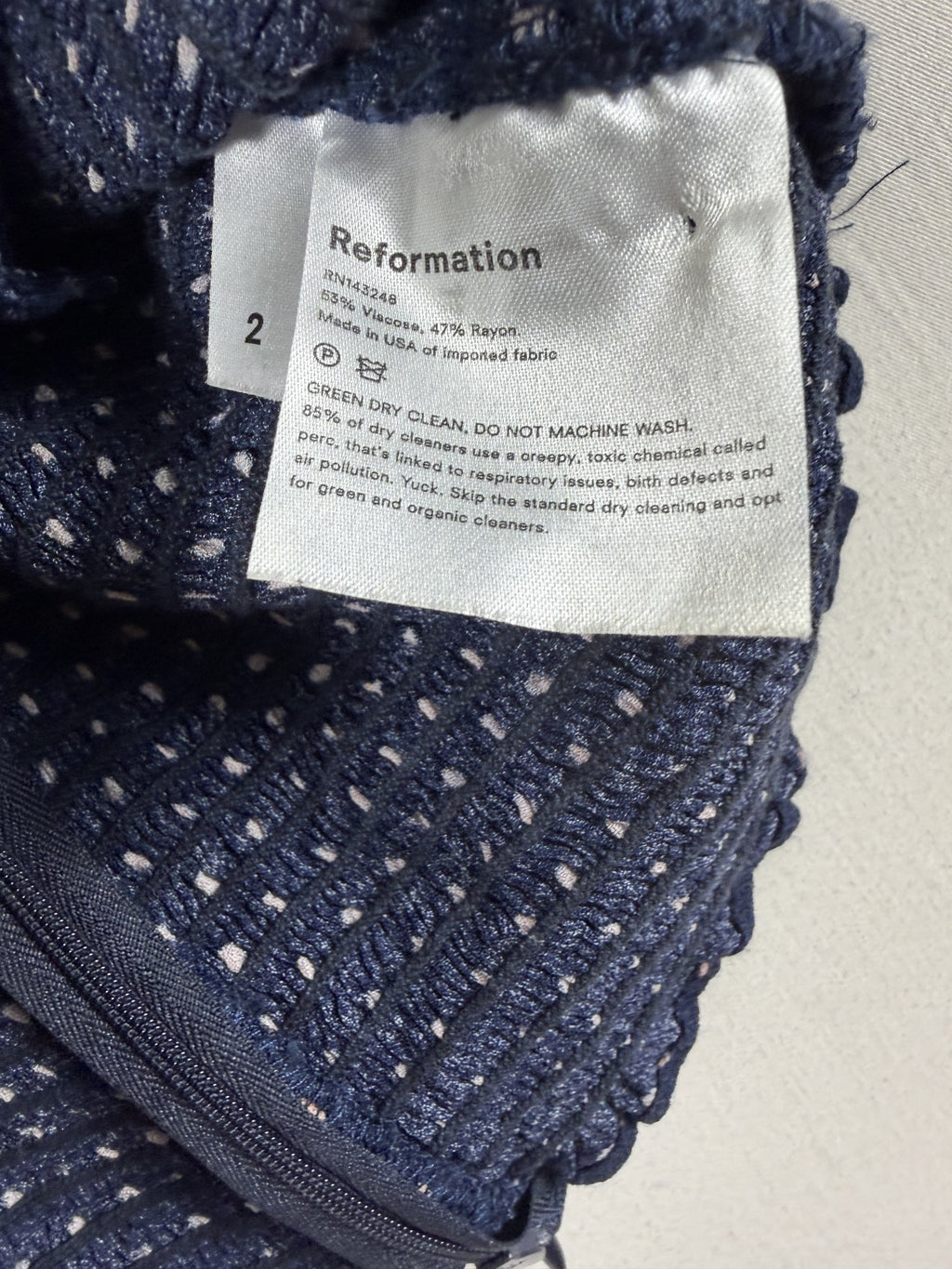 Reformation Polka Dot Tie-Front Puff-Sleeve Crop Top – Navy – label view 2